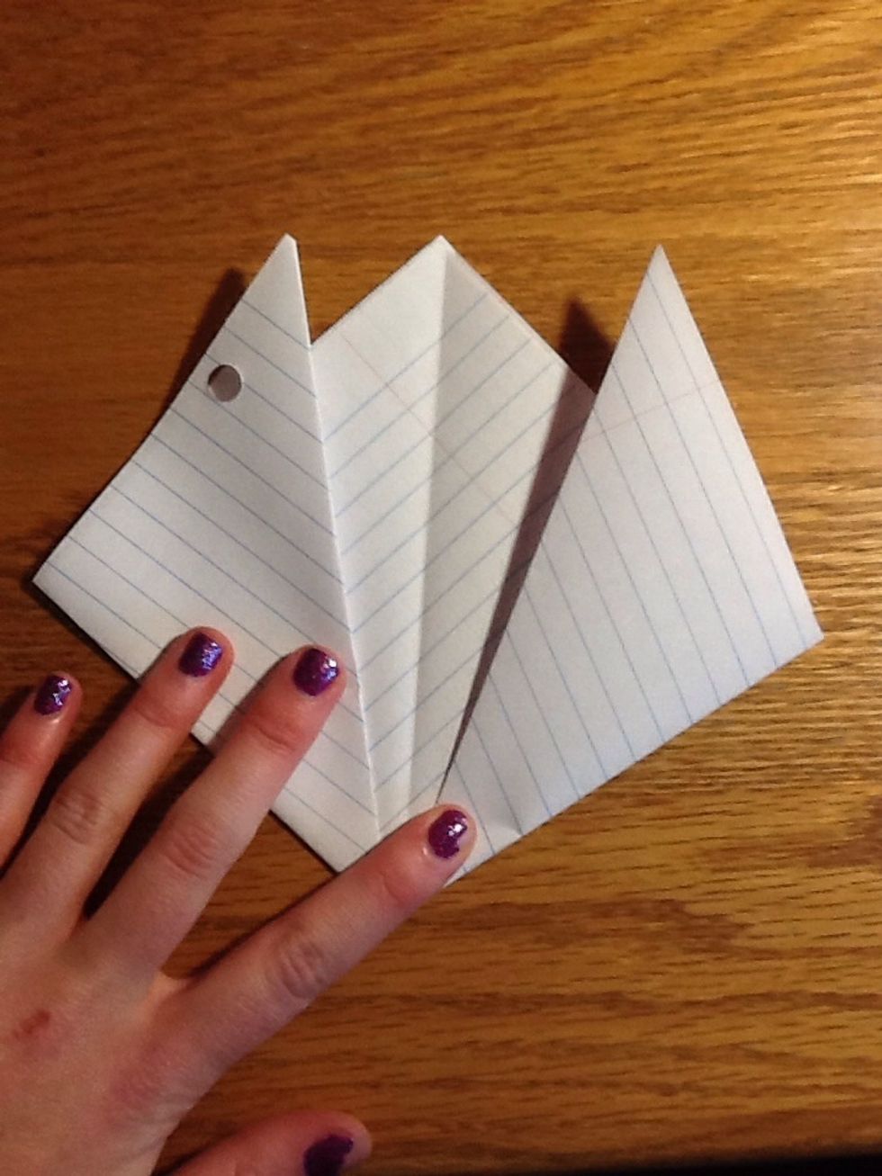 Fold corners up to make the ears.