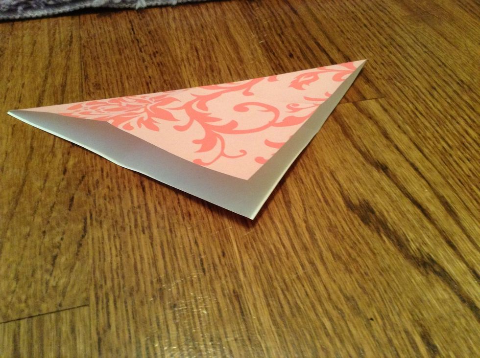 Fold diagonally. Both ways.