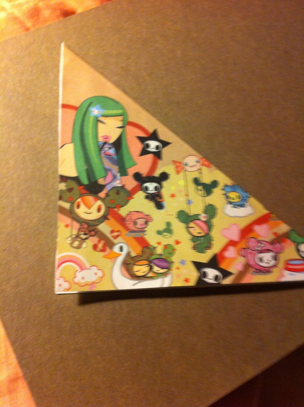 Fold diagonally into a triangle