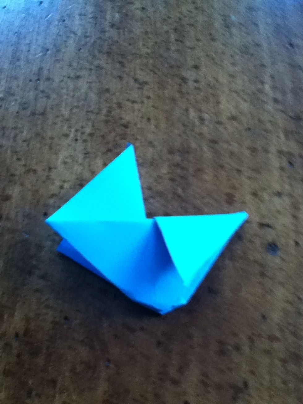 Fold down a sail.