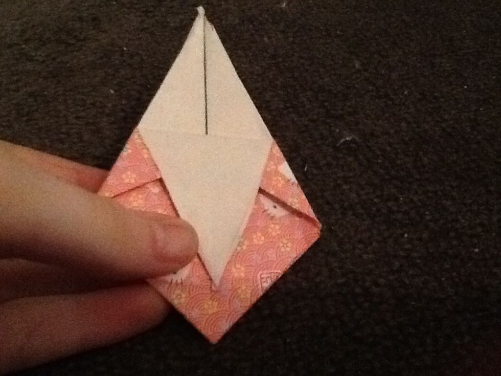 Fold down one point as far as it will go down