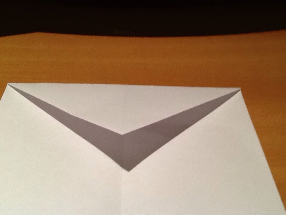 Fold down the the corners that you folded.