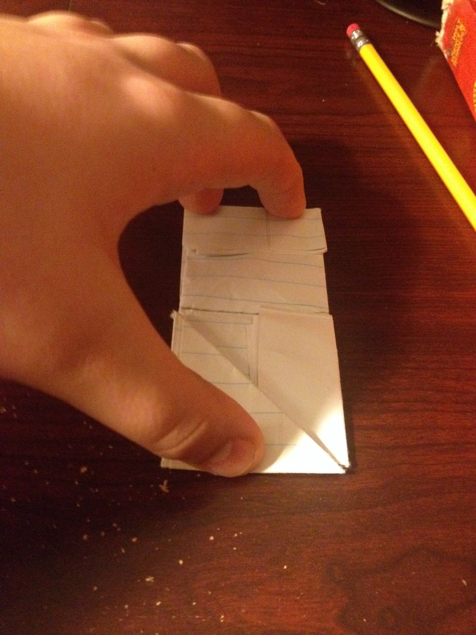 Fold down the tiny rectangle at the top