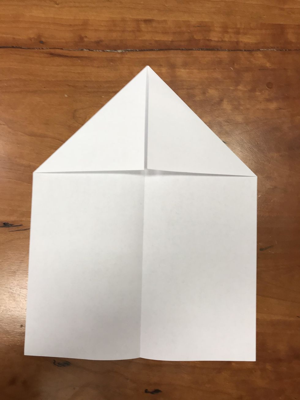 Fold down top corners to center line