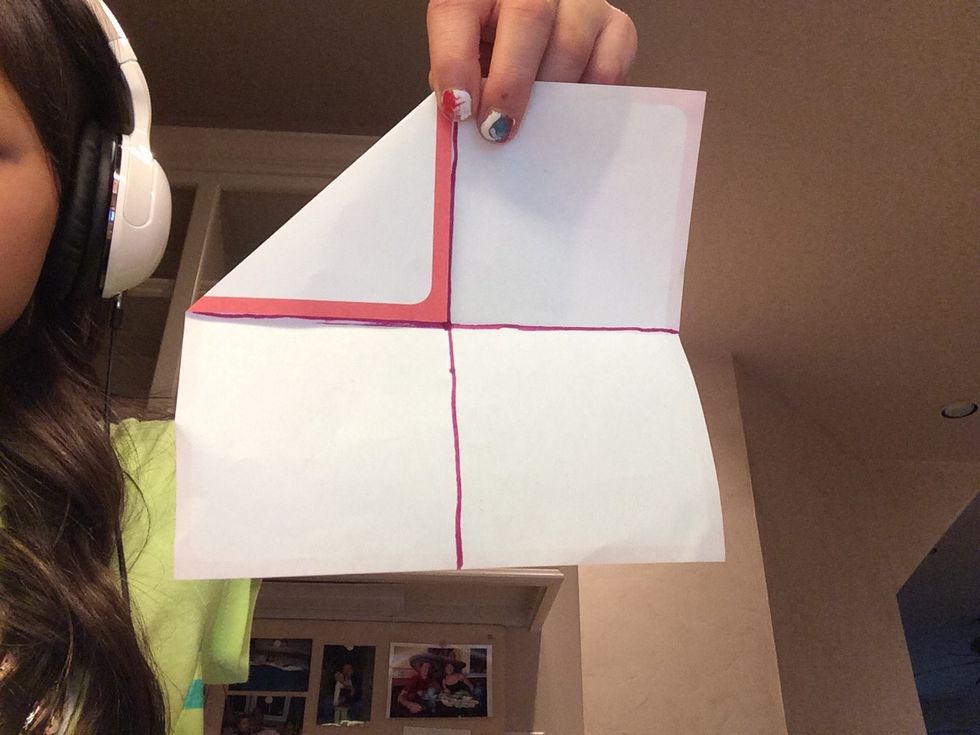 Fold each corner to the center line. ( I traced the creases so you could see)