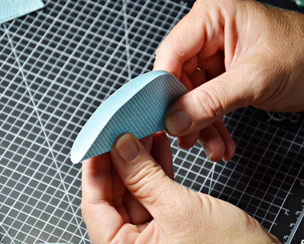 Fold each egg shape in half evenly.