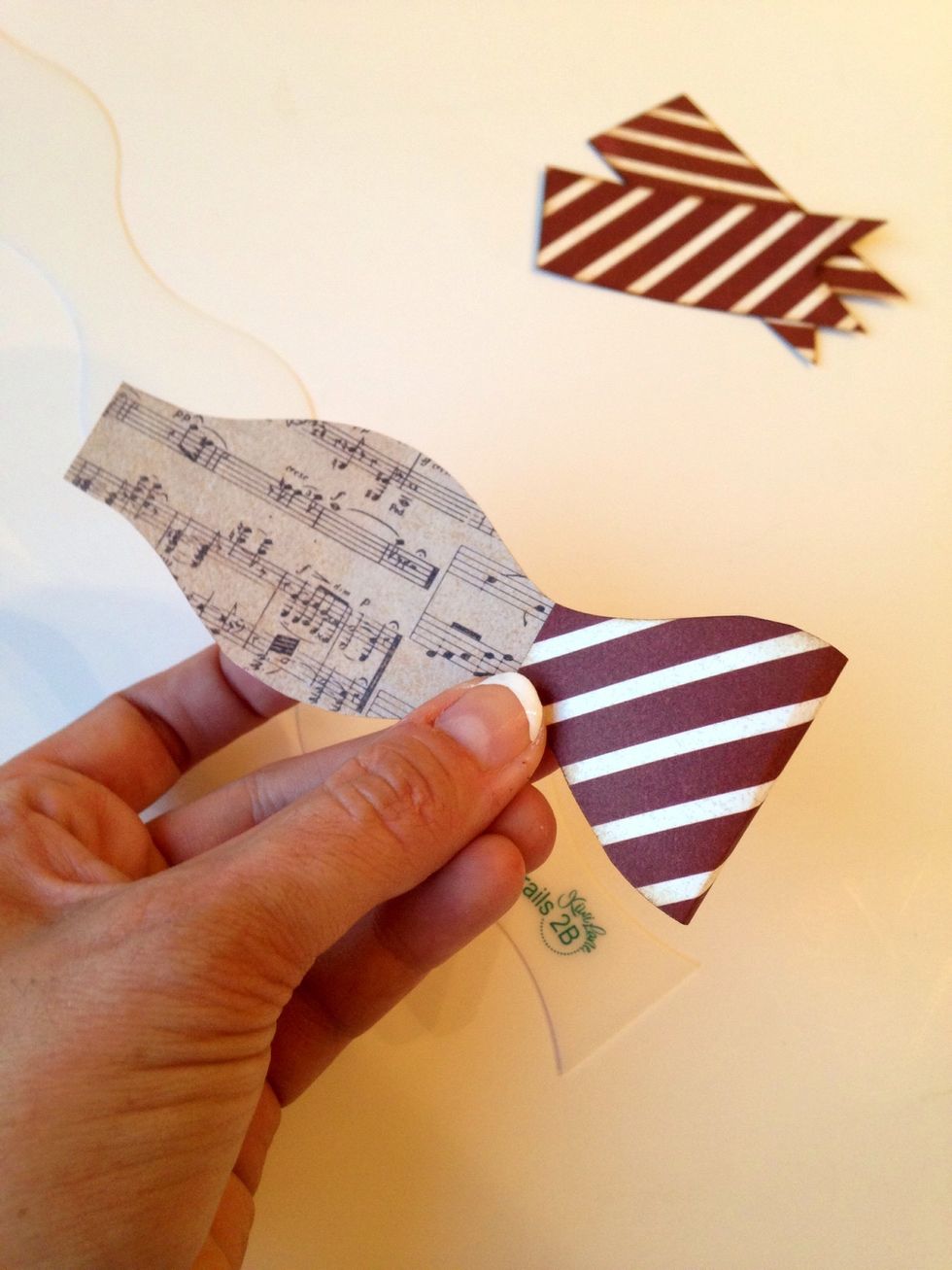 Fold each end to the center to make the bow.