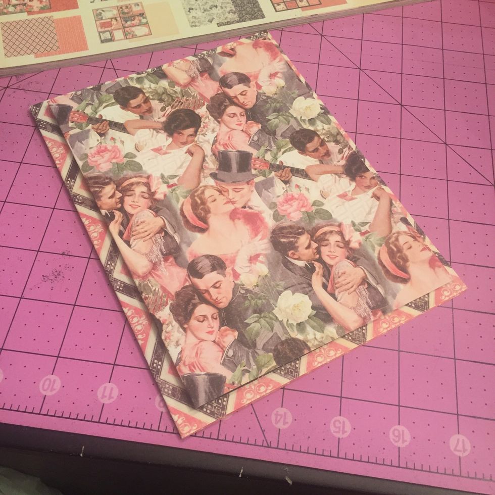 Fold each in half, then trim the main card paper to 8 inches long. Then trim the other piece 7.5 inches long, then trim off .25 inch of the long end. You want the inside piece to be just a bit smaller