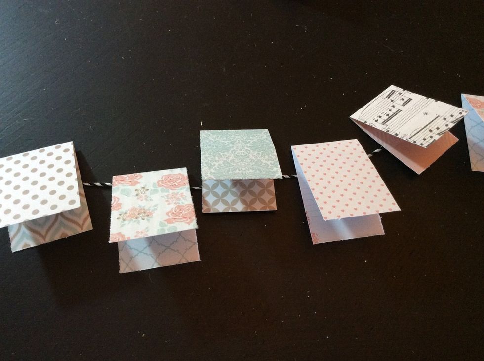 Fold each in half.