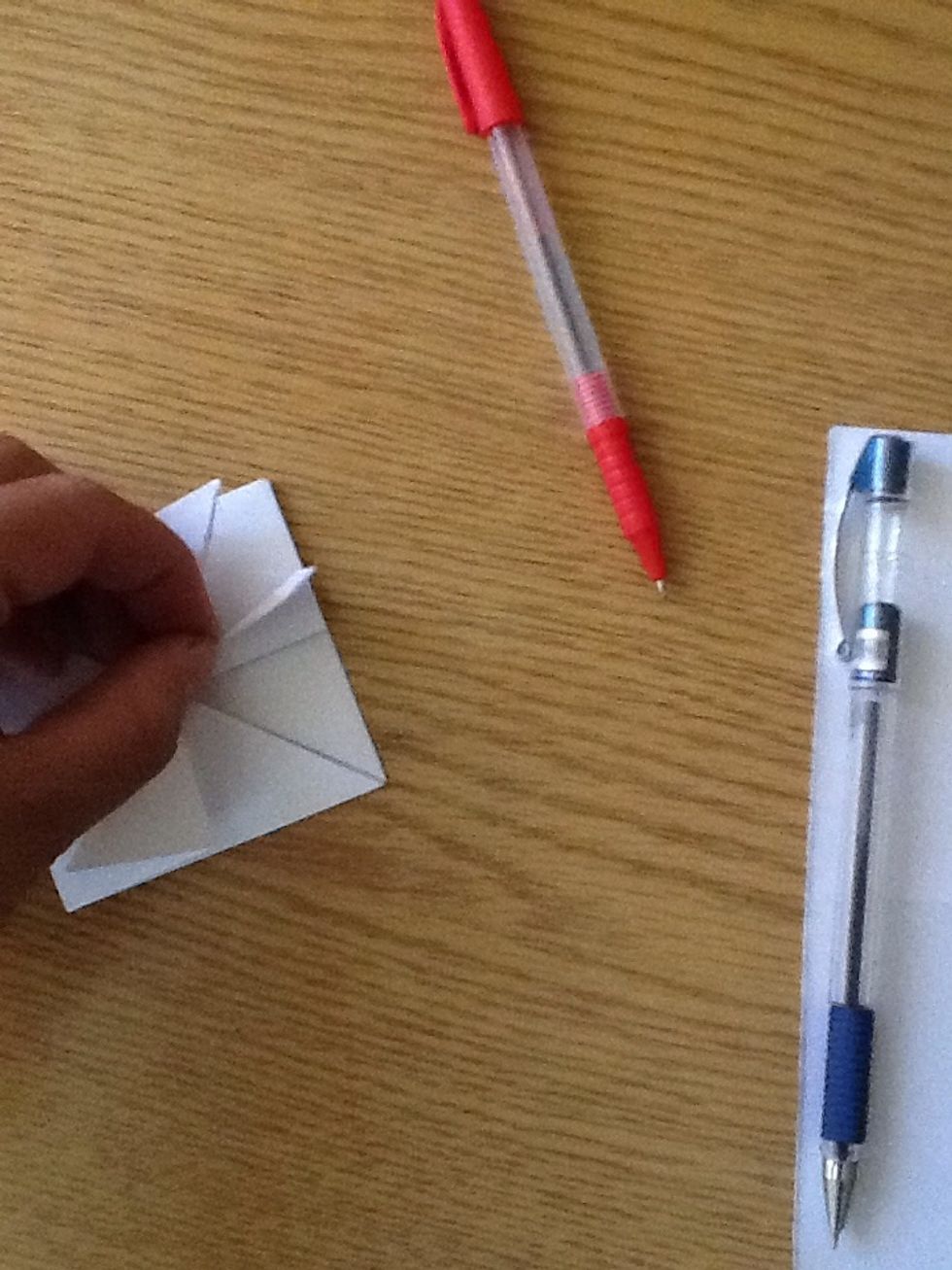 Fold each "leg" into halves along its long axis..