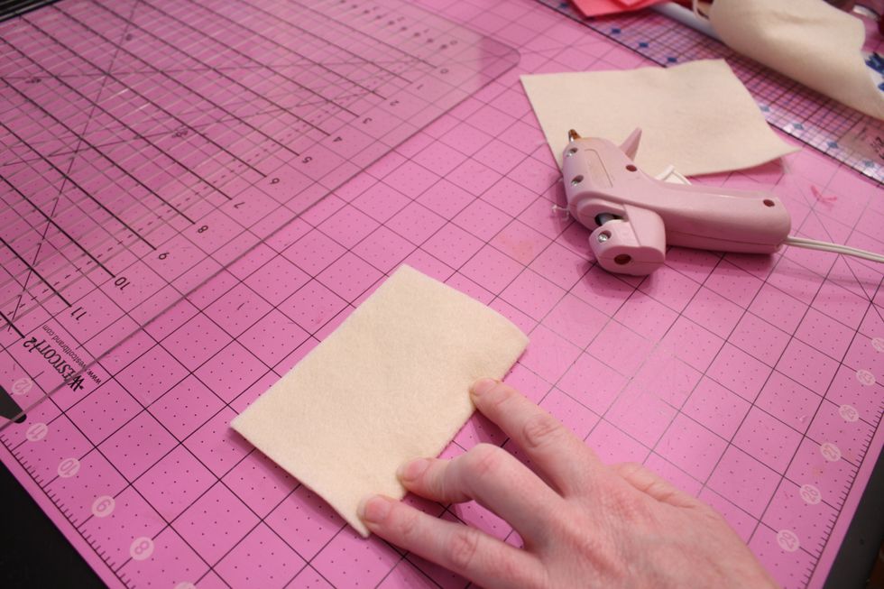 Fold each piece in half (I changed over to cream felt in this pic :)