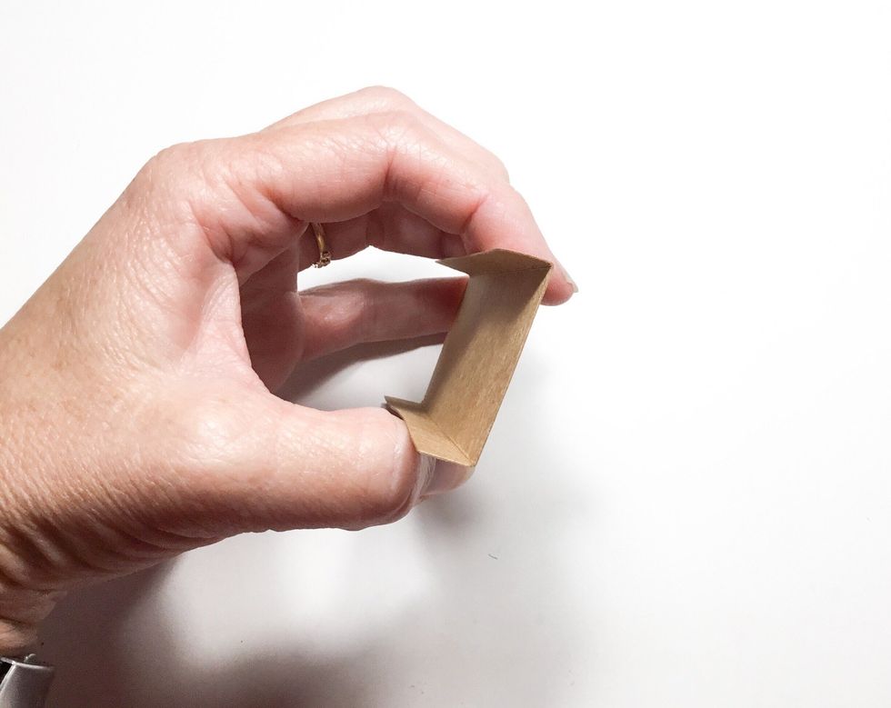 Fold edges as shown.