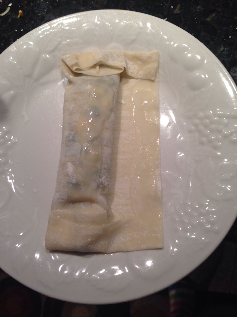 Fold edges over. Then fold it once more and you're finished!