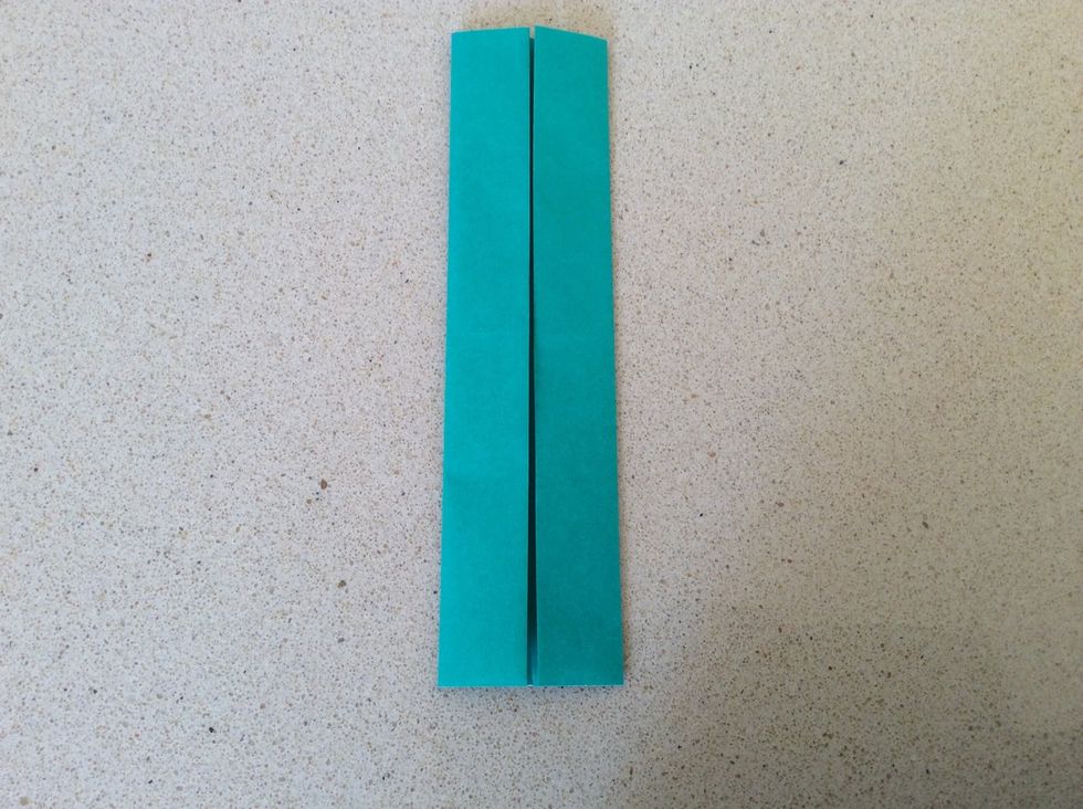 Fold edges to the centre again like so.