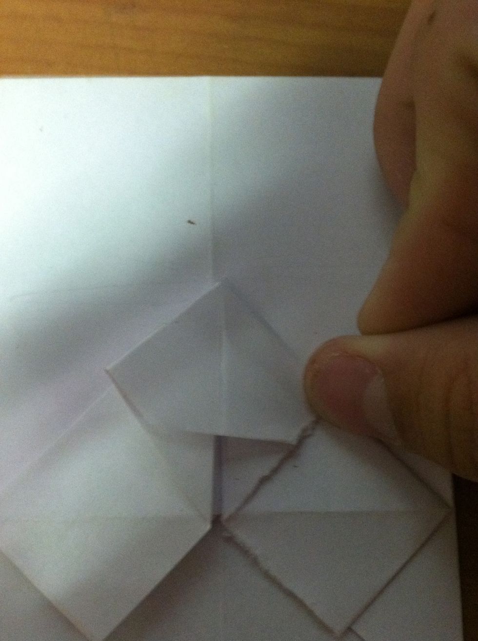 Fold end in a little to make nose