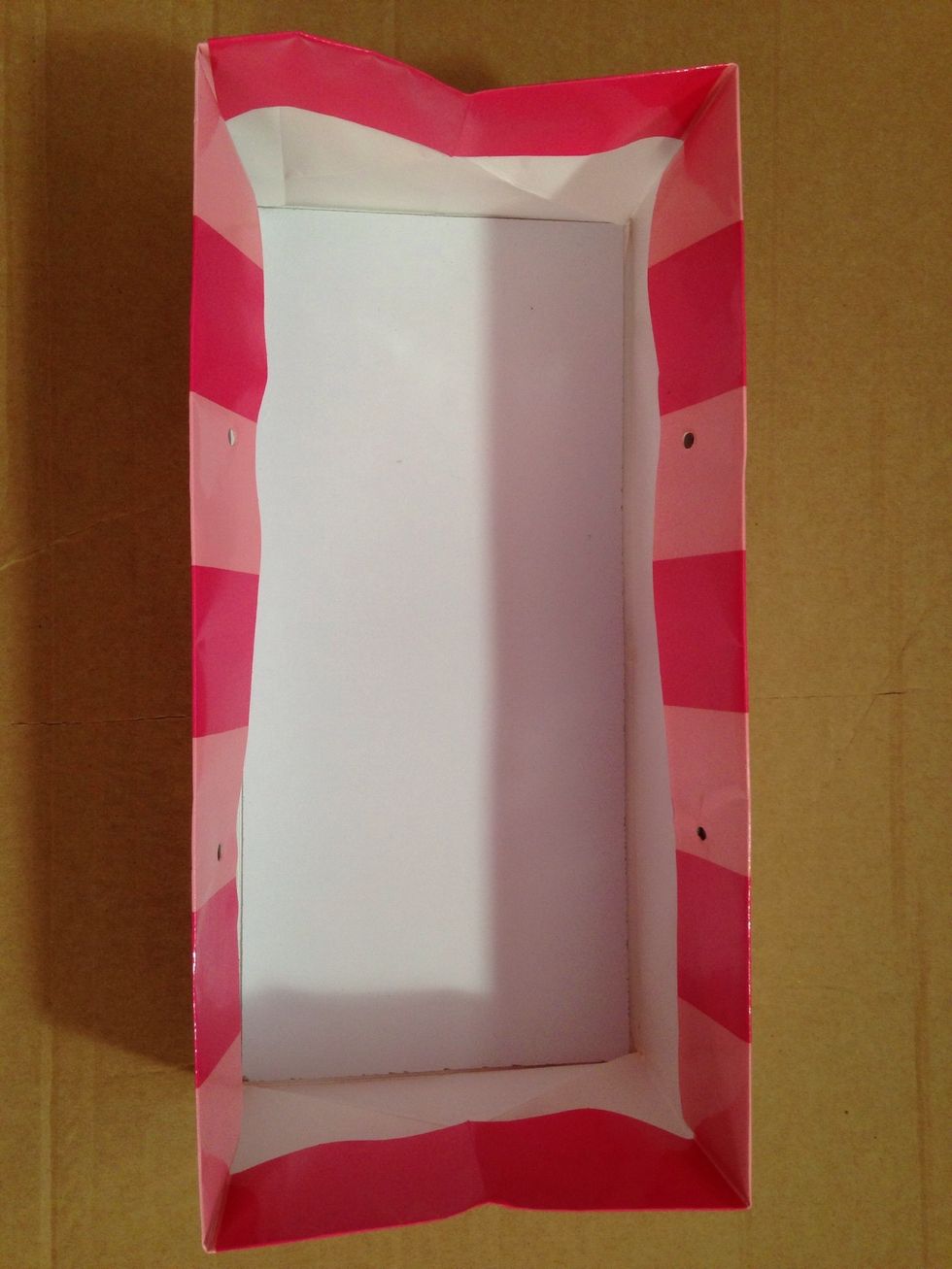 Fold flaps back down covering inner piece.