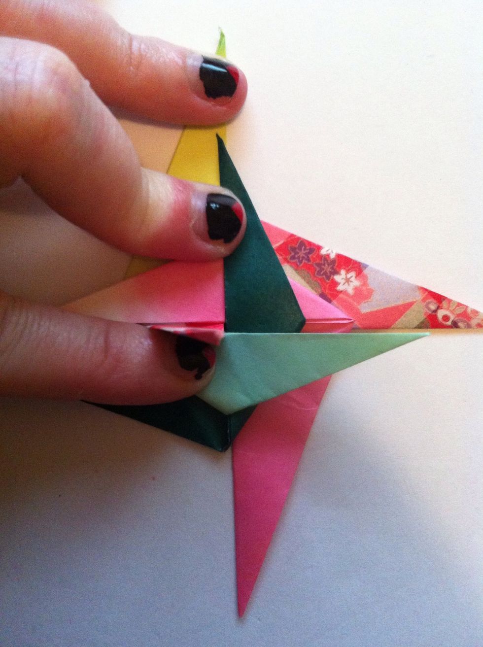 Fold green over to right.