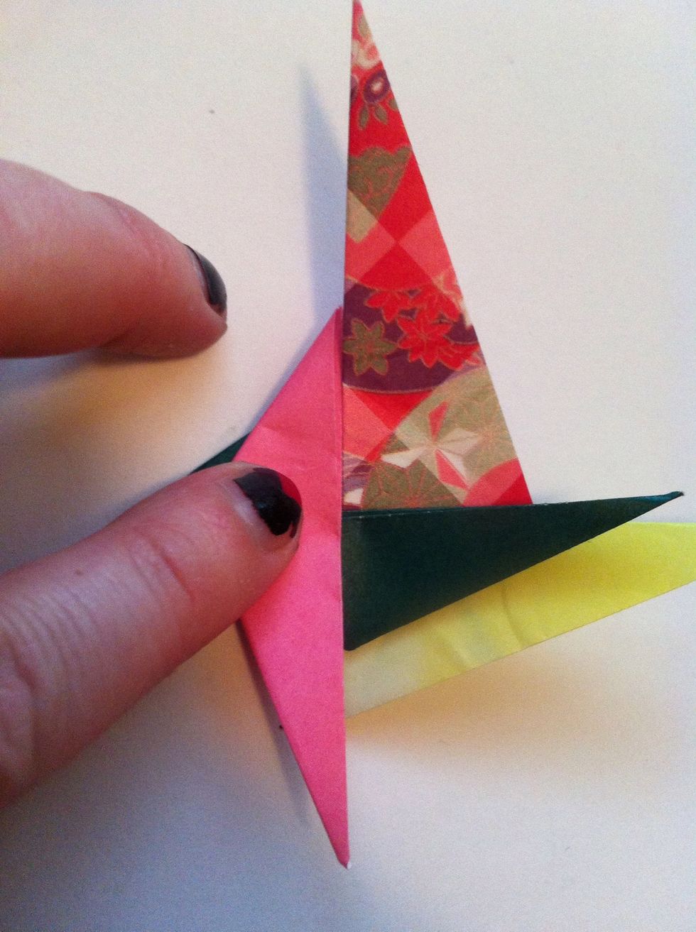 Fold green over to right.