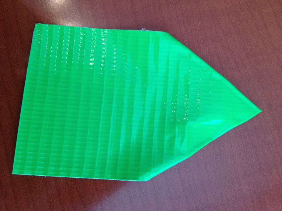 Fold green tape the same way and tape onto flower to make leaves