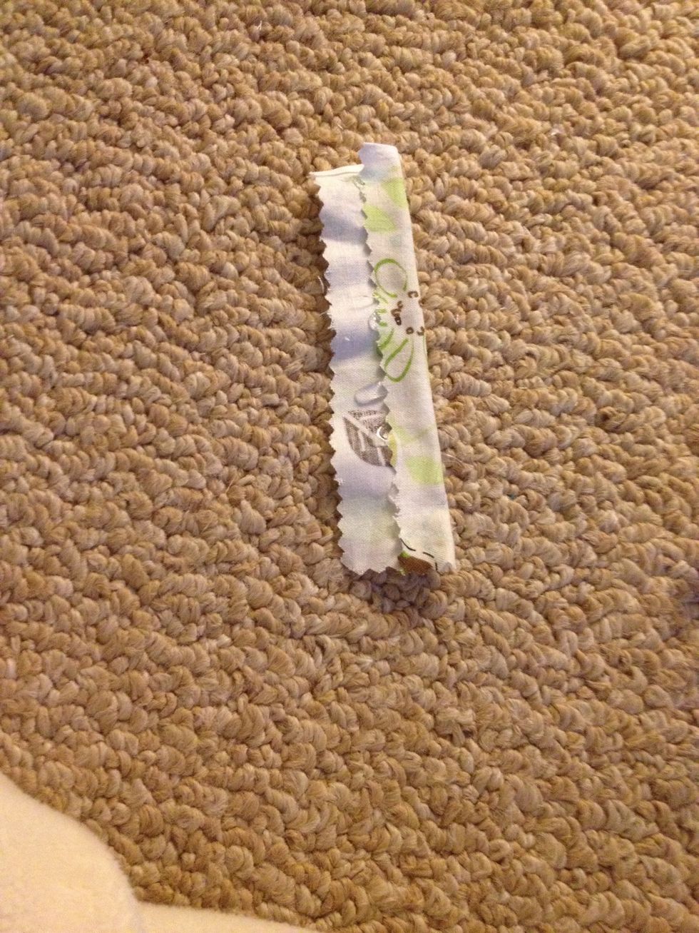 Fold half of your fabric on to the glue like so..