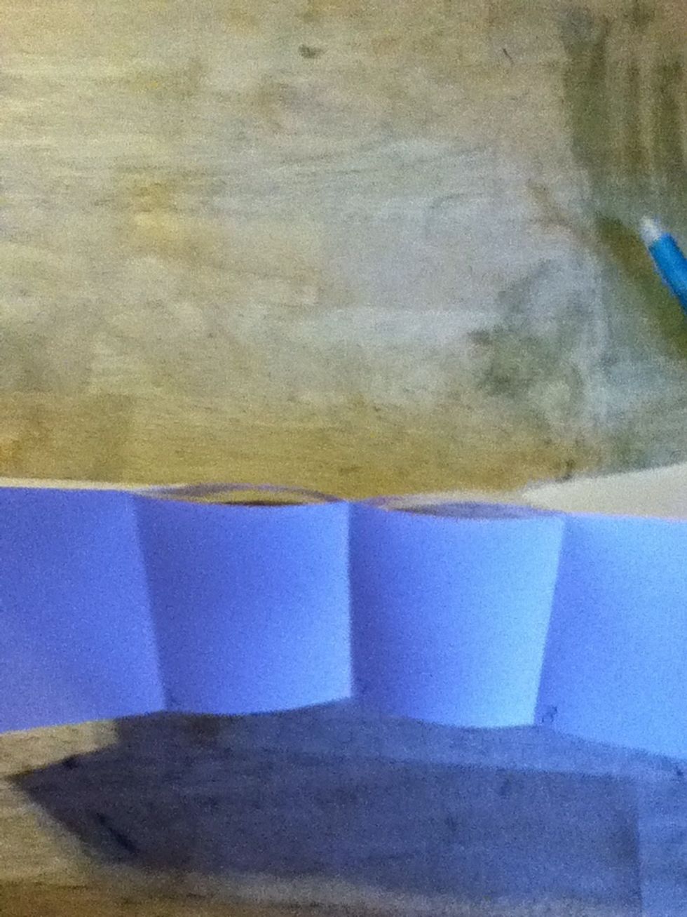 Fold hotdog style and you should see a slit.