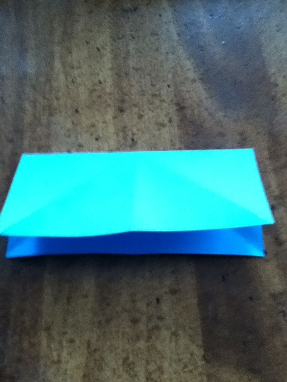 Fold in half again, but in the other direction. This time, do NOT unfold.