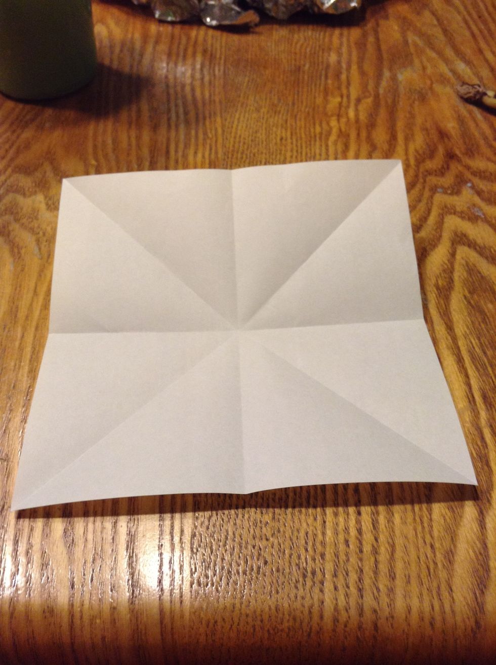 Fold in half both ways in the other way