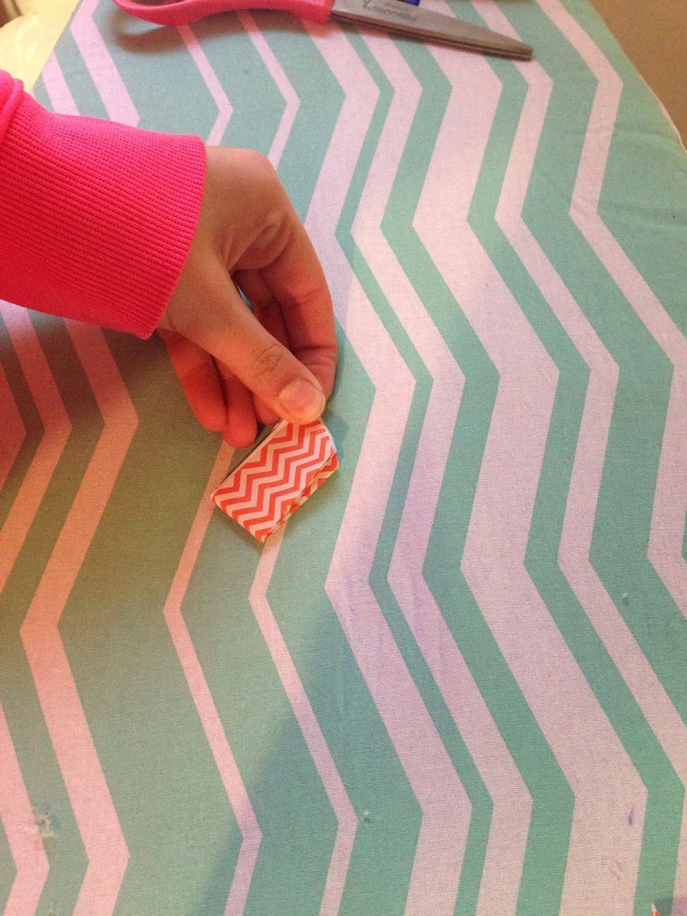 Fold in half both ways.