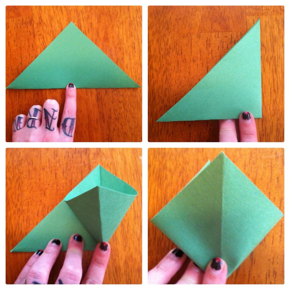 Fold in half diagonally. Fold in half. Raise up top flap & squish flat. Repeat on back. This is called a square base. You will use this for trunk later.