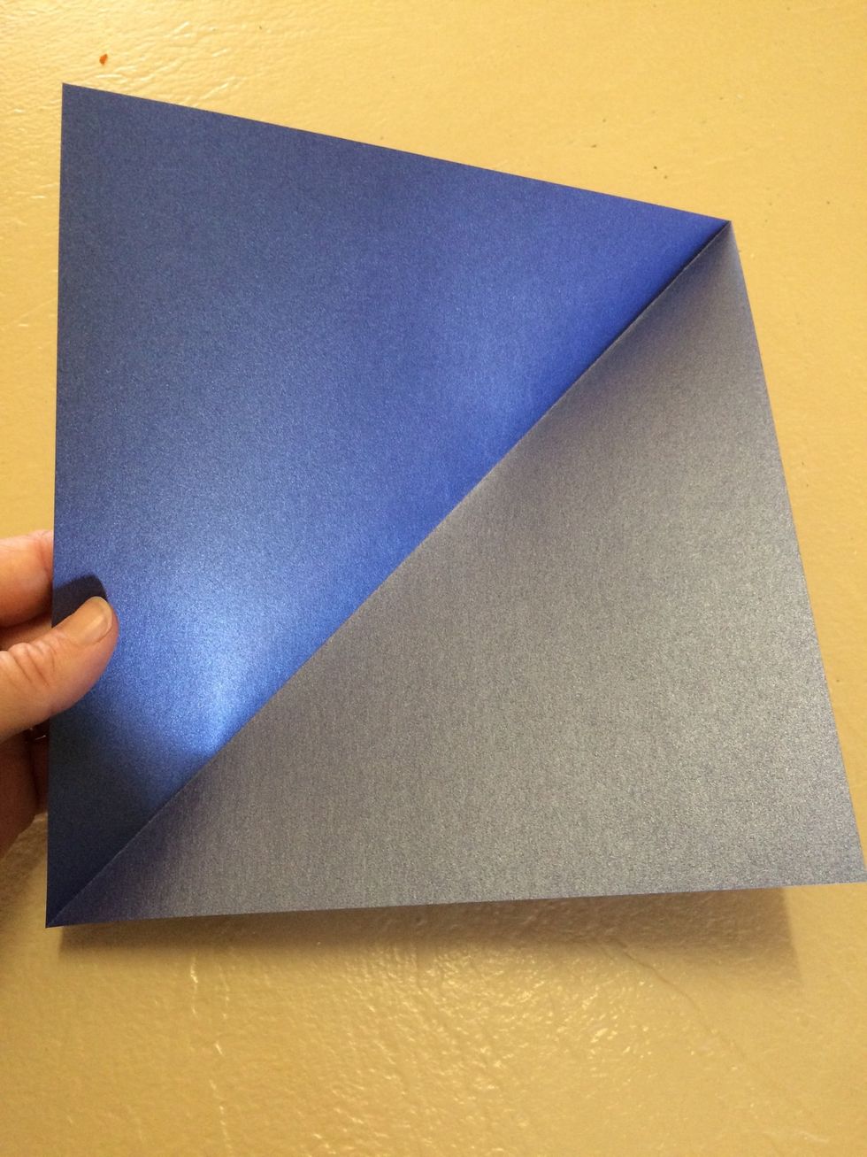 Fold in half diagonally