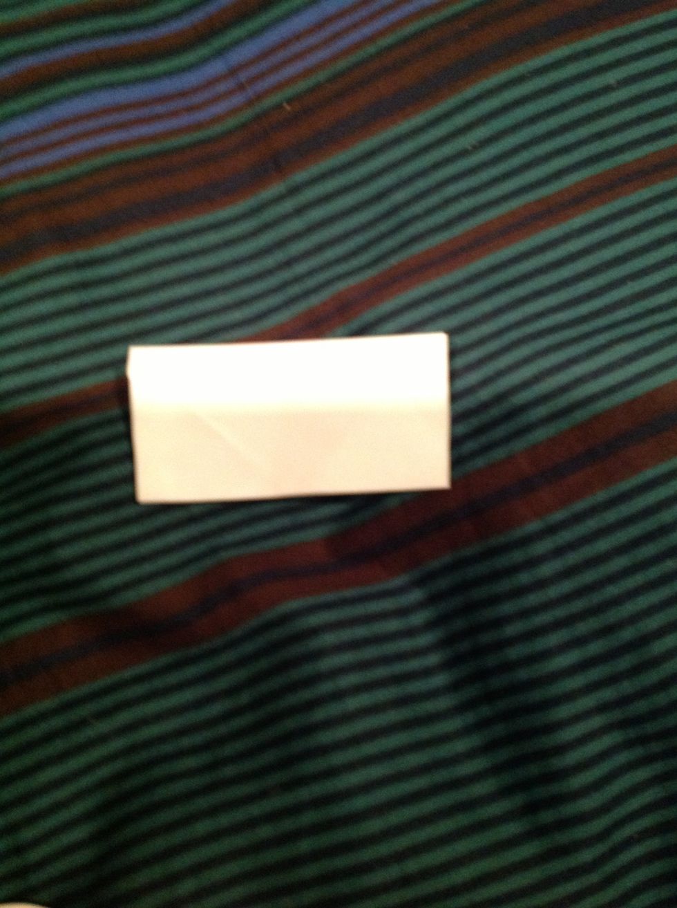 Fold in half from top to bottom.