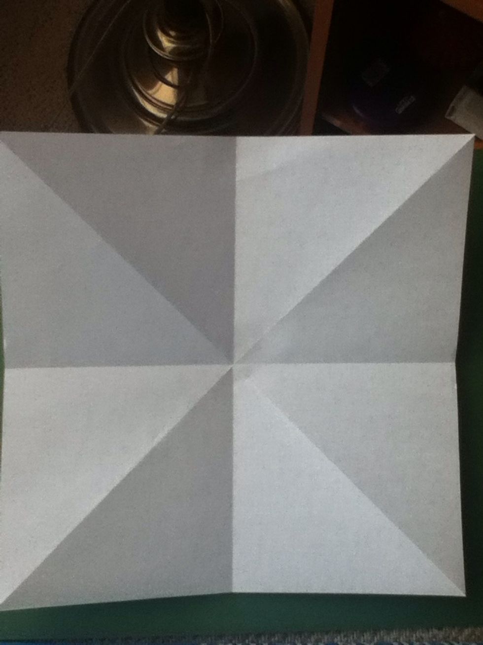 Fold in half horizontally and vertically
