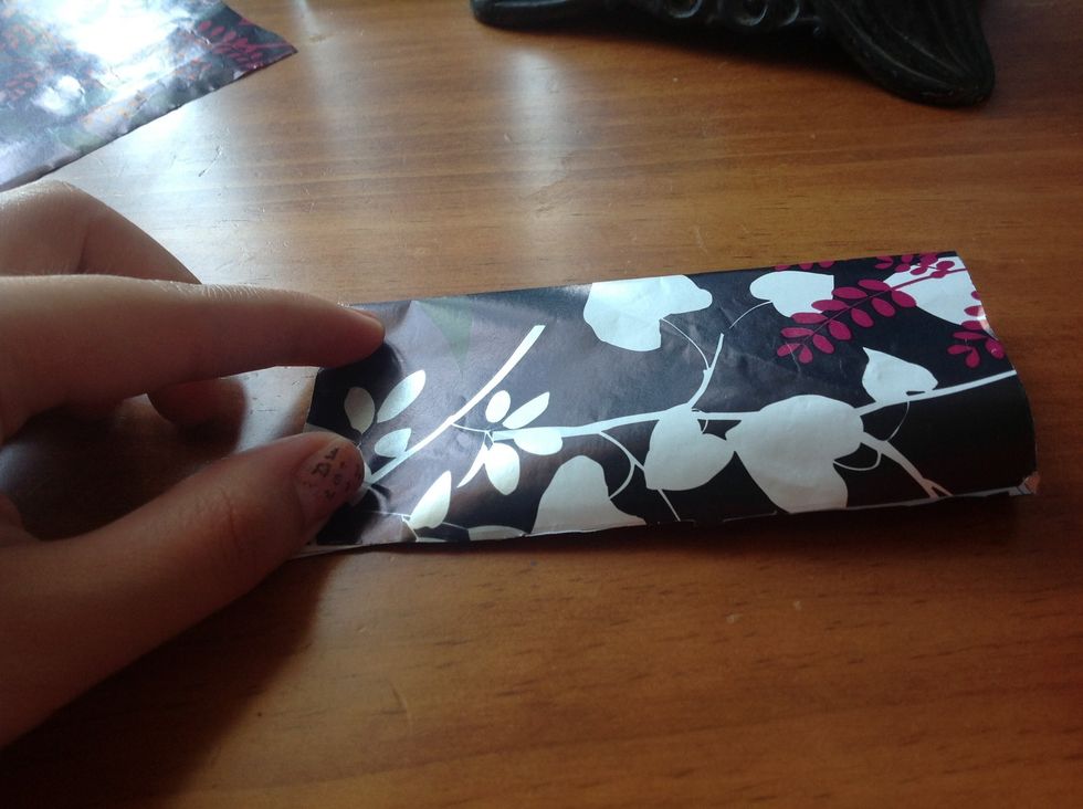 Fold in half horizontally.
