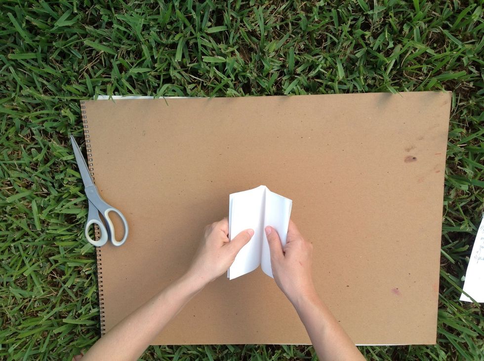 Fold in half so that you have an eight paged booklet.