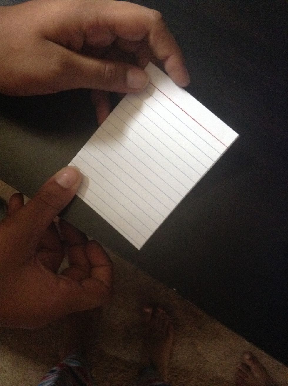 Fold in half the other way. Make sure you fold hard with your nails to make a crease that will help a lot if you don't have scissors.