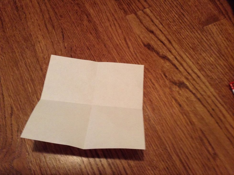 Fold in half the other way too. Creating a cross.