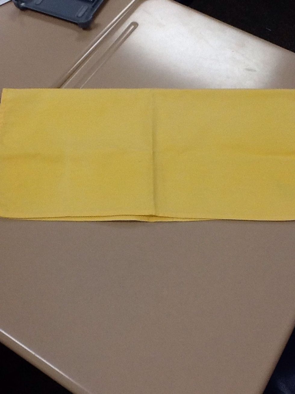 Fold in half with your opening toward you.