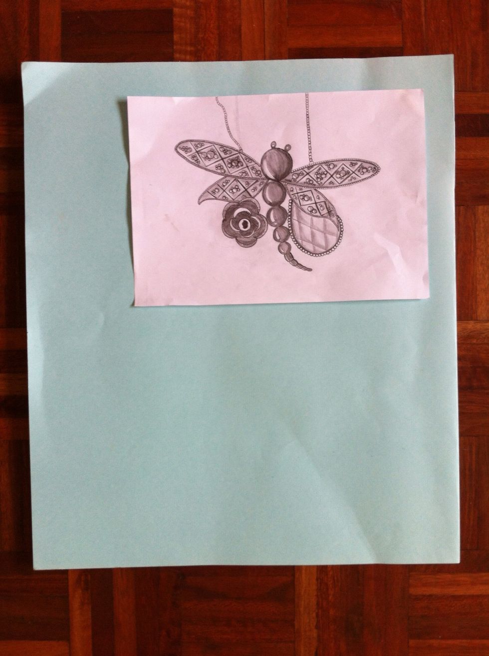 Fold in in such a way that it is folded about 4.5 inches more than half the sheet. This part will serve as a pocket to your folder. You can use an A4 sheet for reference.