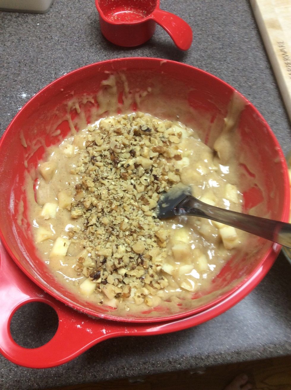 Fold in the apples and walnuts