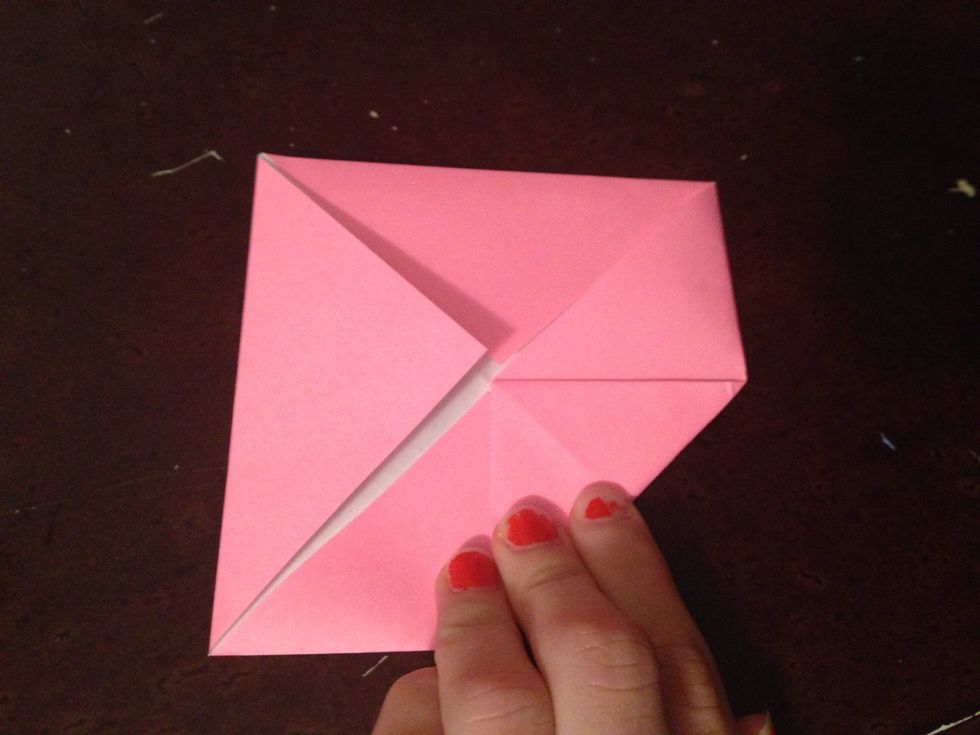 Fold in the corners again