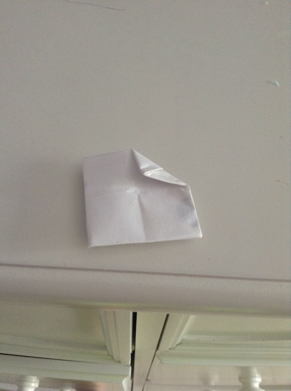 Fold in the corners to the middle