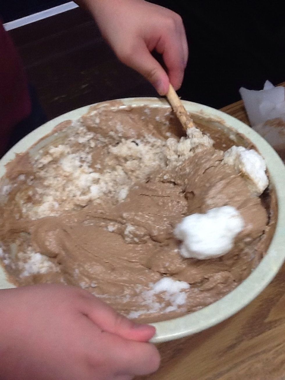 Fold in the egg whites with the mixture.