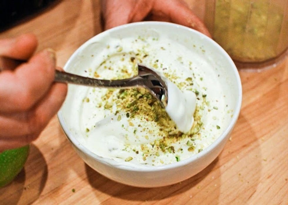 Fold in the finely chopped pistachios.