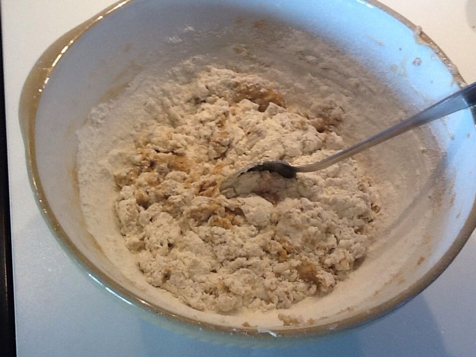 Fold in the flour and milk with a large metal spoon.