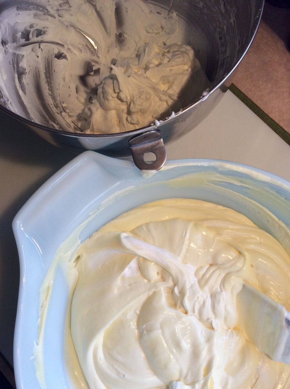 Fold in the remaining half of the whipped cream into the egg and mascarpone mixture.