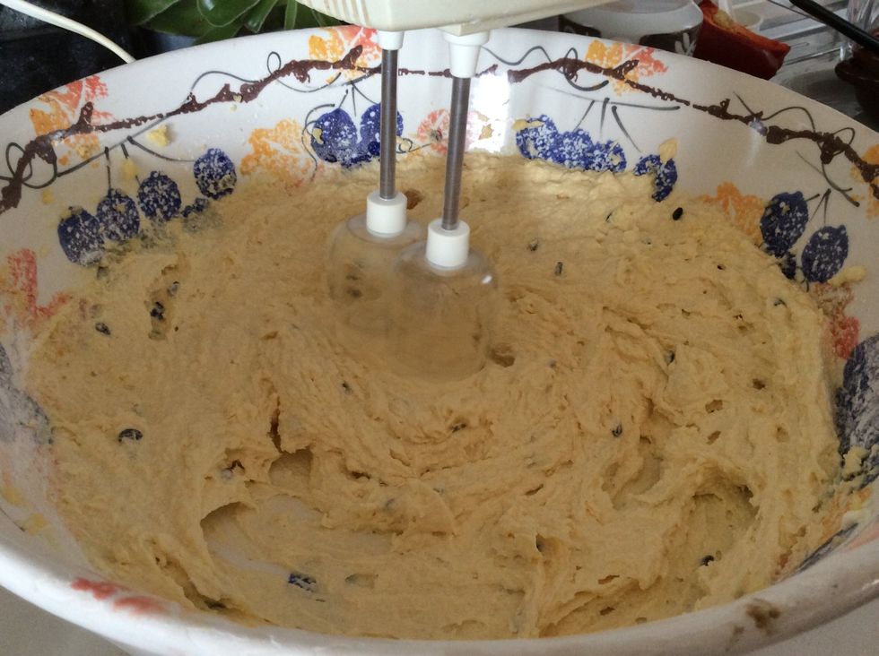 Fold in the rest of the passion fruit, sour cream, flour and coconut just like in the last part