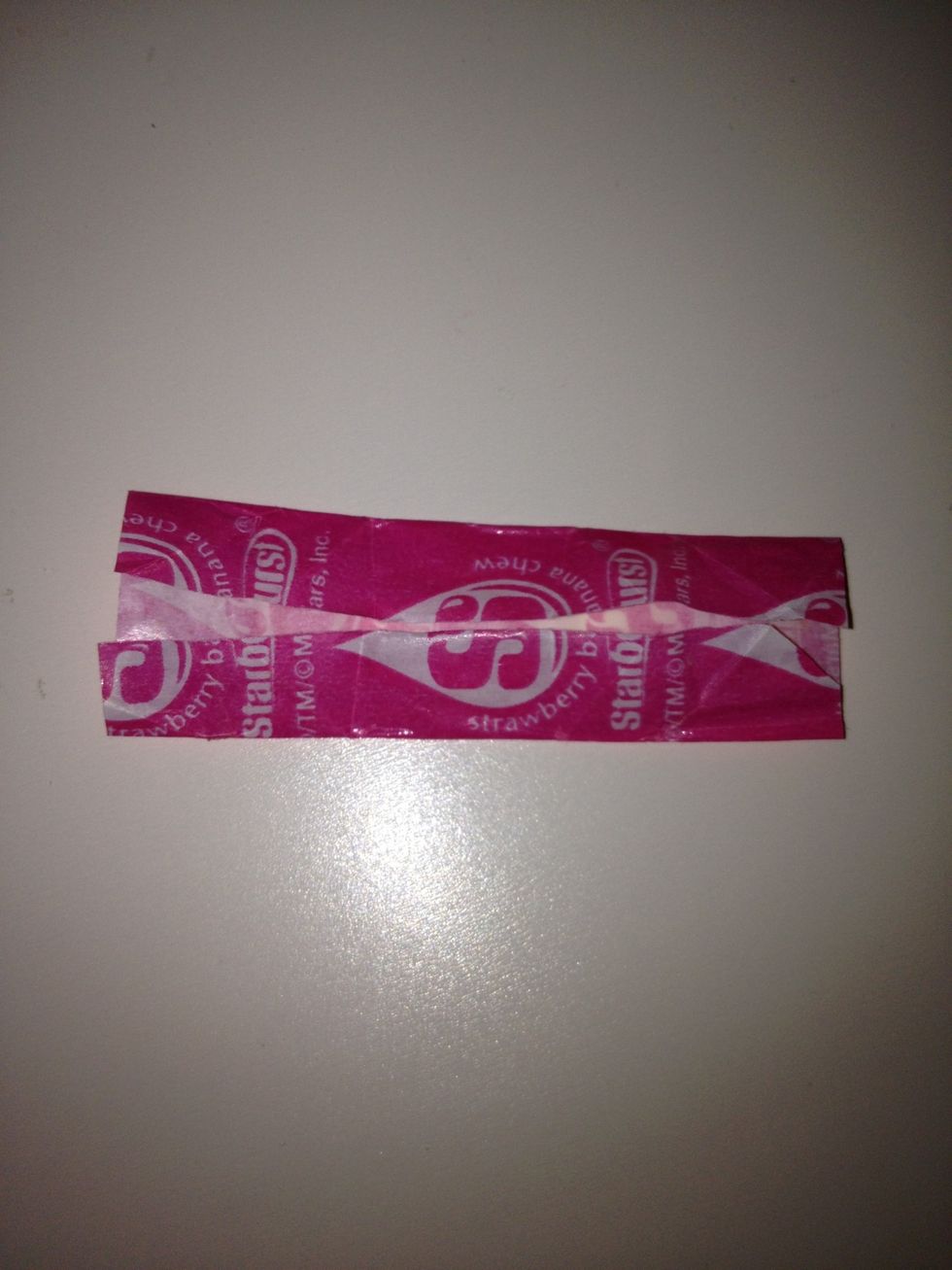 Fold inward on the two creases you should've noticed in the last picture, like so.