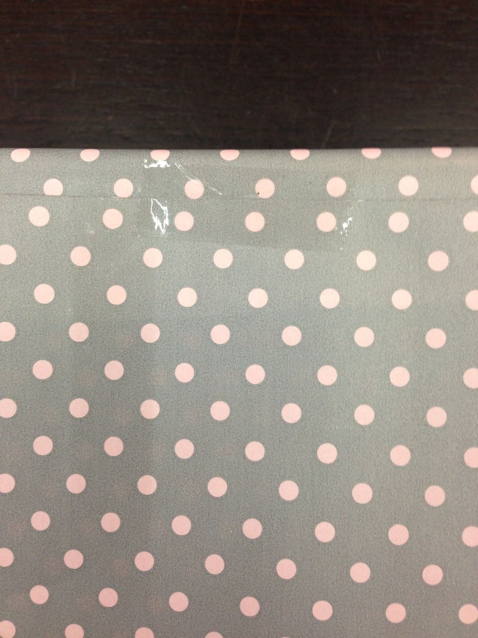 Fold it and stick it with tape. Now you're done with the bottom!:)