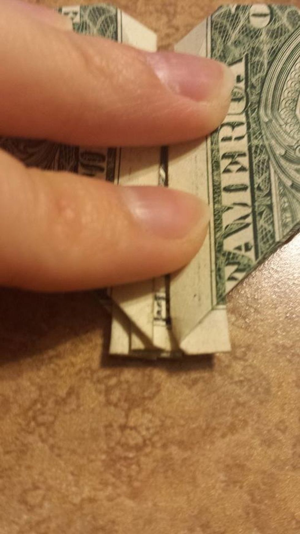 Fold it and tuck the things on the bottom in and you're done! Finally!! XD