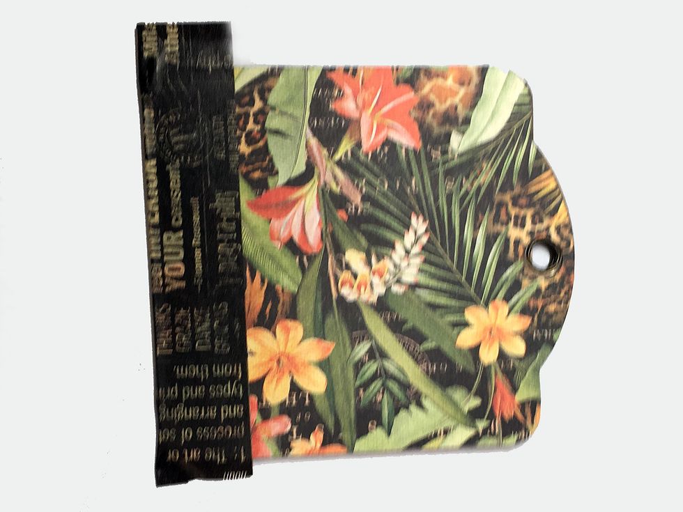 Fold it around to the back cover and press firmly in place being careful to have any air bubbles.